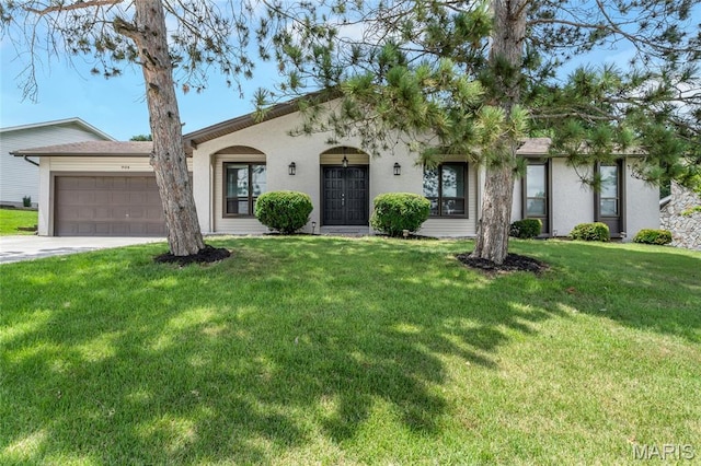 904 Ampere Pl, Lake St Louis, MO 63367 - view of front of property with an attached garage, concrete driveway, stucco siding, and a front yard