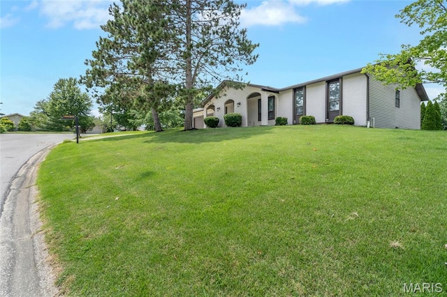 904 Ampere Pl, Lake St Louis, MO 63367 - view of front of property with a front yard and stucco siding
