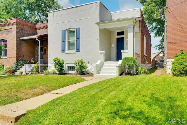 3253 Walter Ave, Maplewood, MO 63143 - view of front of house featuring a front yard and brick siding
