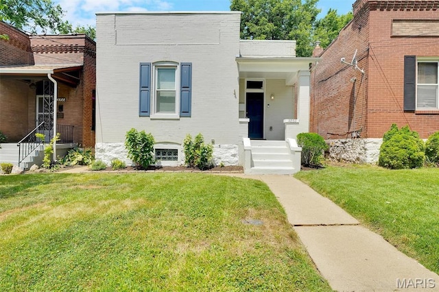 3253 Walter Ave, Maplewood, MO 63143 - view of front of property featuring a front lawn and brick siding