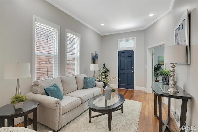 3253 Walter Ave, Maplewood, MO 63143 - living room featuring ornamental molding, light wood-style floors, and recessed lighting