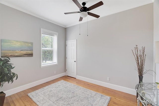 3253 Walter Ave, Maplewood, MO 63143 - living area with a ceiling fan, light wood-type flooring, and ornamental molding