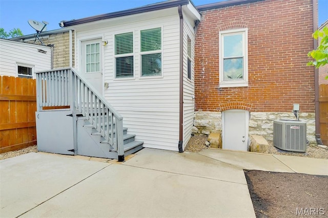 3253 Walter Ave, Maplewood, MO 63143 - back of house with a patio and brick siding