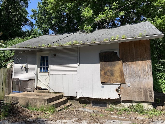 8268 Brenner Ave, Saint Louis, MO 63114 - view of home's exterior with entry steps and roof with shingles