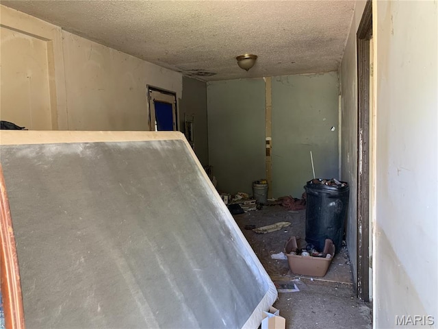 8268 Brenner Ave, Saint Louis, MO 63114 - stairway with a textured ceiling