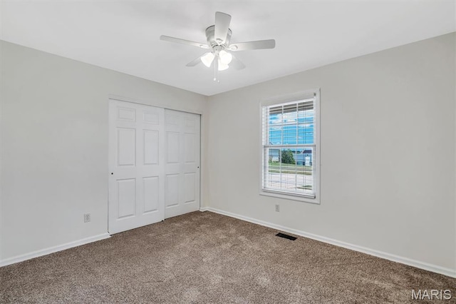 3848 Bedford Pointe Dr, Wentzville, MO 63385 - unfurnished bedroom with carpet floors, a closet, and ceiling fan