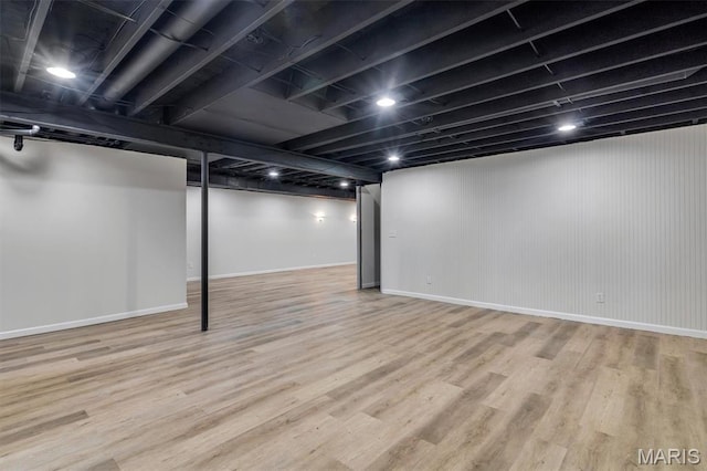 3848 Bedford Pointe Dr, Wentzville, MO 63385 - finished basement featuring wood finished floors and baseboards