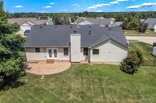 3848 Bedford Pointe Dr, Wentzville, MO 63385 - rear view of property featuring french doors, a chimney, a patio, roof with shingles, and entry steps