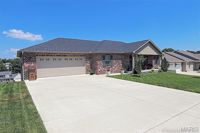3576 Mill View Xing, Cape Girardeau, MO 63701 - ranch-style house featuring an attached garage, driveway, a front yard, and brick siding