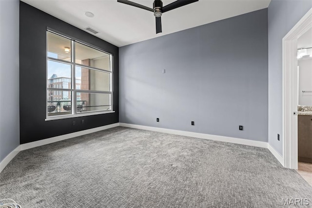 8025 Maryland Ave Unit 8H, Clayton, MO 63105 - carpeted spare room with a ceiling fan and baseboards