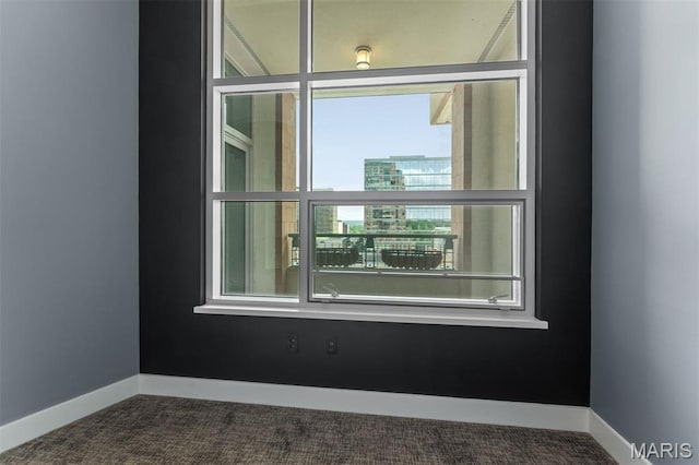8025 Maryland Ave Unit 8H, Clayton, MO 63105 - empty room with dark carpet and a view of city