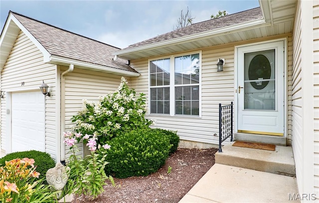 108 Fort Worth Way, Wright City, MO 63390 - property entrance with a shingled roof and a garage