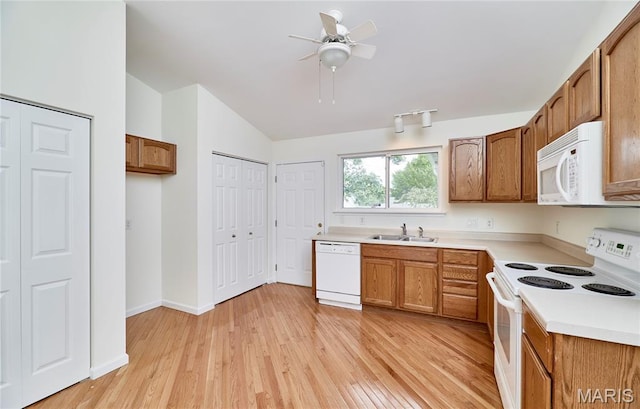 108 Fort Worth Way, Wright City, MO 63390 - kitchen featuring white appliances, light wood-style floors, brown cabinets, light countertops, and ceiling fan