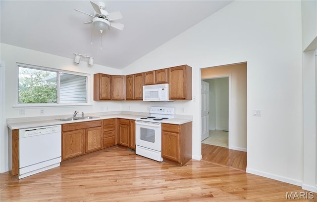 108 Fort Worth Way, Wright City, MO 63390 - kitchen featuring white appliances, light wood-style floors, light countertops, a ceiling fan, and brown cabinets