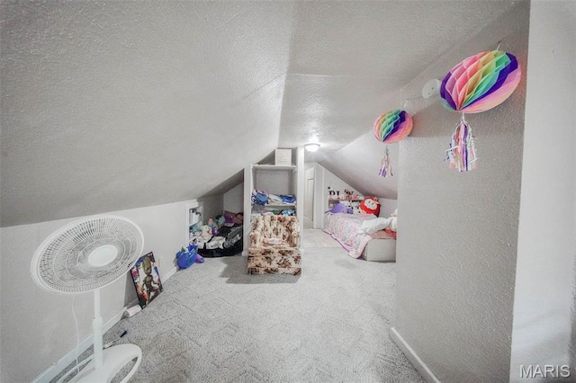 110 S Oak St, Rolla, MO 65401 - bedroom featuring a textured ceiling, carpet, and lofted ceiling