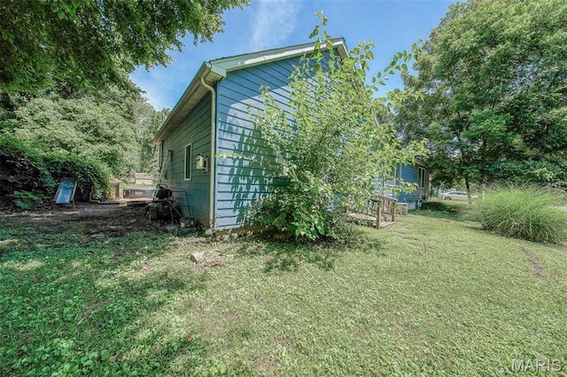 110 S Oak St, Rolla, MO 65401 - view of home's exterior with a lawn