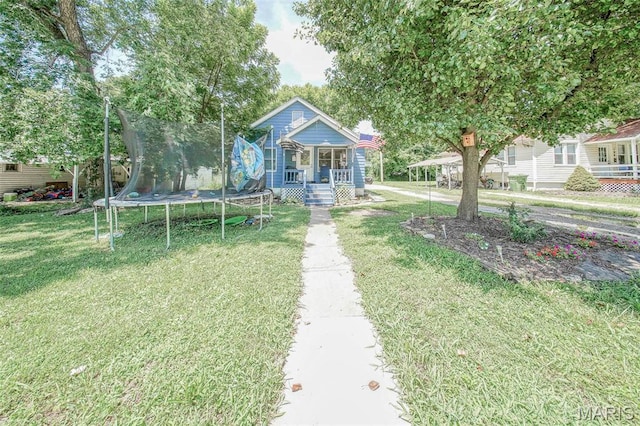 110 S Oak St, Rolla, MO 65401 - bungalow-style house featuring a trampoline, covered porch, and a front yard