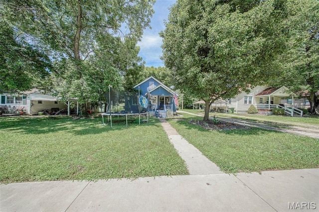 110 S Oak St, Rolla, MO 65401 - bungalow-style home featuring a trampoline, a front yard, and a porch
