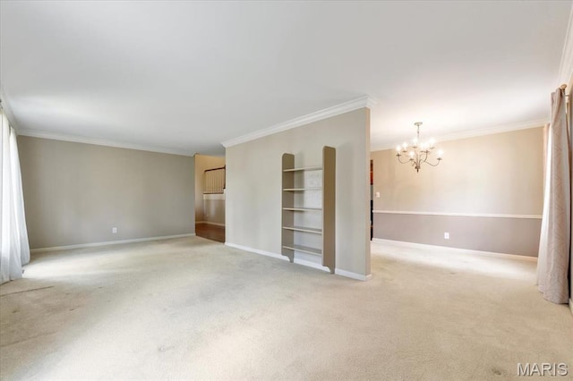 15693 Dresden Lake Ct, Chesterfield, MO 63017 - empty room featuring light carpet, a chandelier, and crown molding