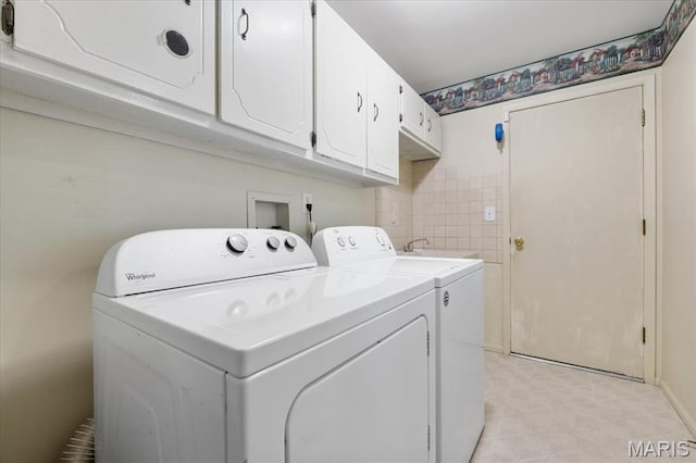 15693 Dresden Lake Ct, Chesterfield, MO 63017 - laundry area with cabinet space and washer and dryer