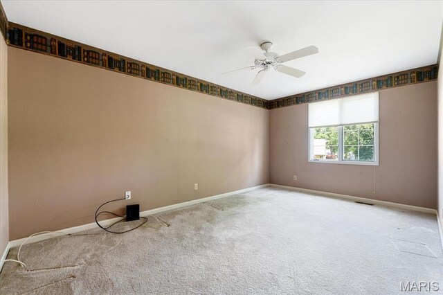 15693 Dresden Lake Ct, Chesterfield, MO 63017 - carpeted spare room with baseboards and a ceiling fan