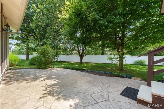 15693 Dresden Lake Ct, Chesterfield, MO 63017 - fenced backyard featuring a patio area