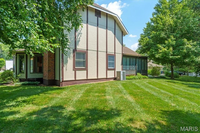 15693 Dresden Lake Ct, Chesterfield, MO 63017 - rear view of house with a yard and stucco siding