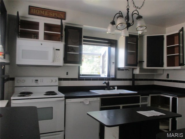 2823 Darwin Ct, Saint Louis, MO 63121 - kitchen featuring white appliances, dark countertops, a chandelier, white cabinets, and open shelves