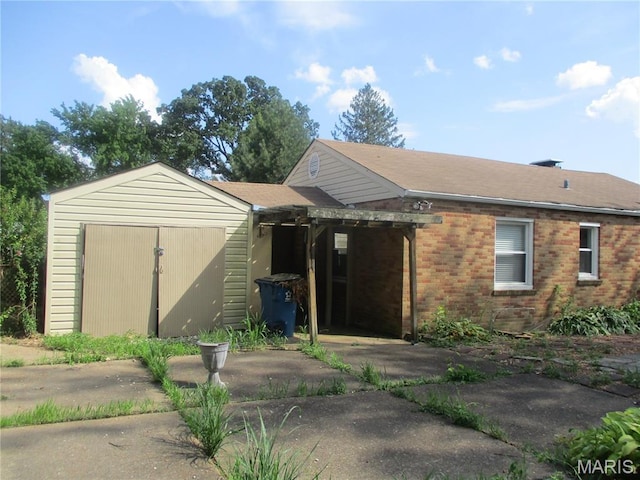 2823 Darwin Ct, Saint Louis, MO 63121 - view of front of house with brick siding and a shingled roof