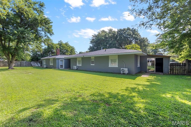 503 Emerson St, Kennett, MO 63857 - rear view of house featuring a chimney and stucco siding