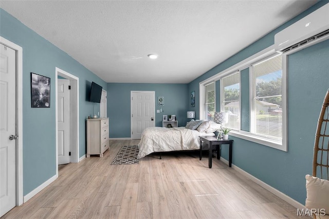 503 Emerson St, Kennett, MO 63857 - bedroom with light wood-style flooring and baseboards