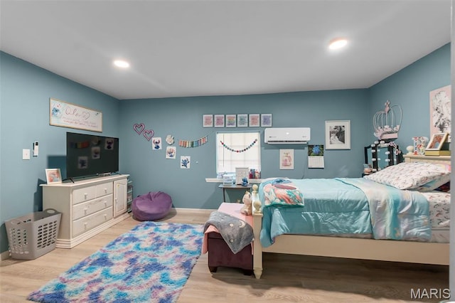503 Emerson St, Kennett, MO 63857 - bedroom with wood finished floors and recessed lighting