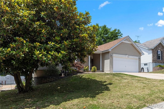 4632 Greenore Dr, High Ridge, MO 63049 - view of property hidden behind natural elements with a garage and concrete driveway