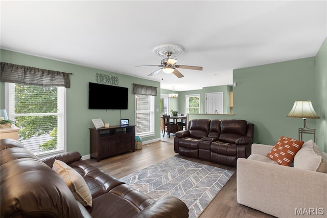 4632 Greenore Dr, High Ridge, MO 63049 - living area featuring wood finished floors, healthy amount of natural light, and ceiling fan