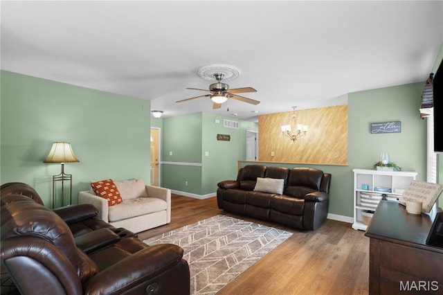 4632 Greenore Dr, High Ridge, MO 63049 - living area featuring a chandelier, wood finished floors, and ceiling fan