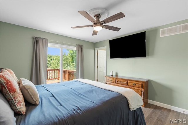 4632 Greenore Dr, High Ridge, MO 63049 - bedroom featuring access to exterior, wood finished floors, and ceiling fan