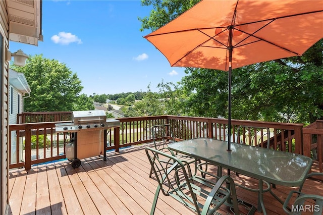 4632 Greenore Dr, High Ridge, MO 63049 - deck featuring area for grilling, outdoor dining space, and view of scattered trees