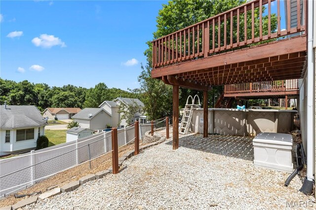 4632 Greenore Dr, High Ridge, MO 63049 - fenced backyard with a wooden deck