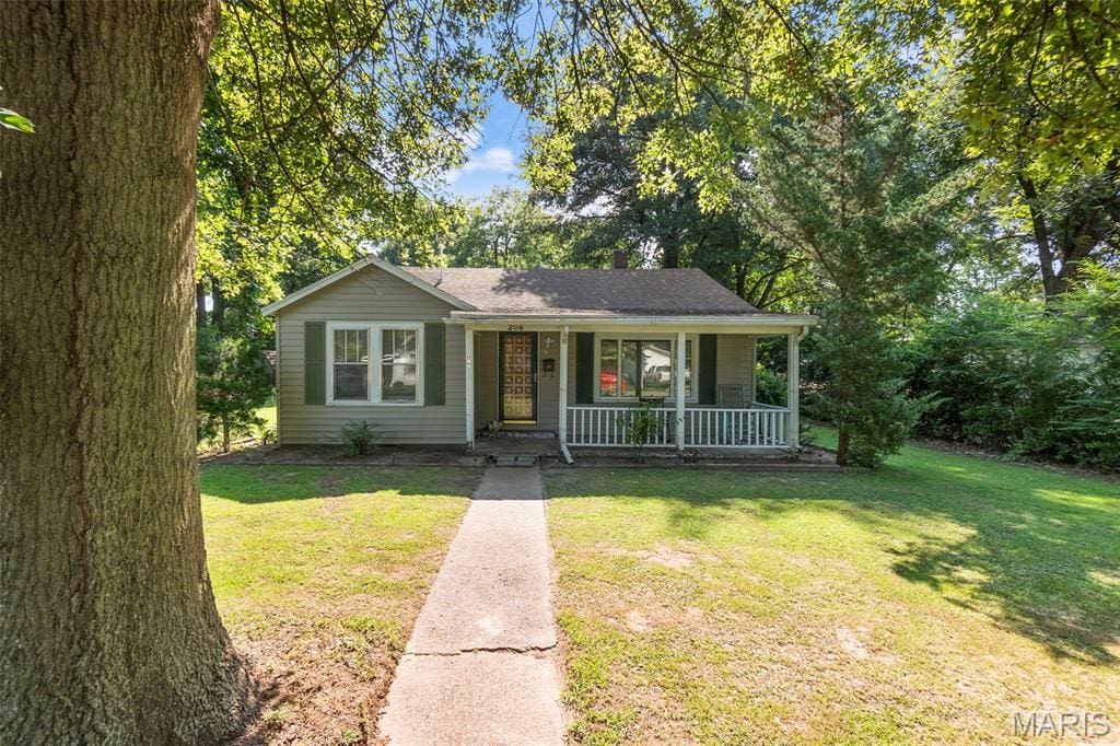 206 Holt St, Kennett, MO 63857 - photo 1