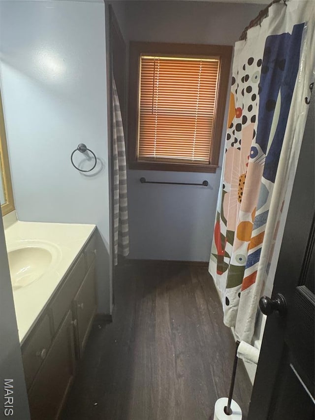 7 N Leota St Unit 7, Dexter, MO 63841 - bathroom with wood finished floors and vanity