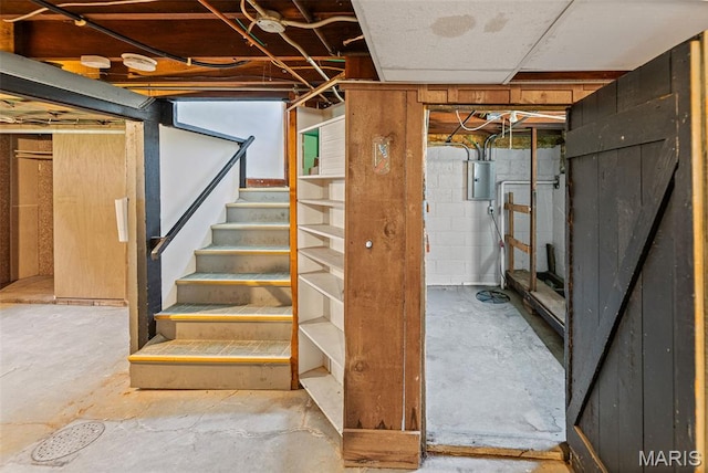 25 S 77th St, Belleville, IL 62223 - unfinished basement featuring electric panel and stairs
