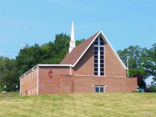 4869 Scottsdale Rd, House Springs, MO 63051 - view of side of property with a lawn, a chimney, and a garage
