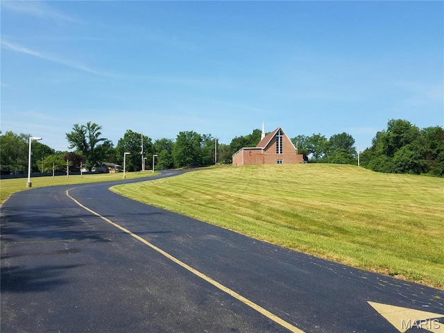 4869 Scottsdale Rd, House Springs, MO 63051 - view of asphalt road with a barn