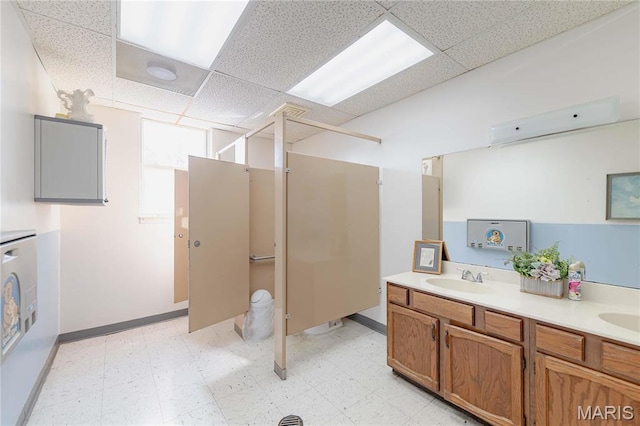 4869 Scottsdale Rd, House Springs, MO 63051 - full bath featuring tile patterned floors, a drop ceiling, double vanity, and a shower