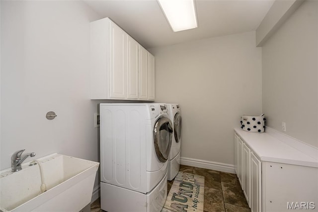 2314 Longest Dr, Wentzville, MO 63385 - laundry area with cabinet space and independent washer and dryer
