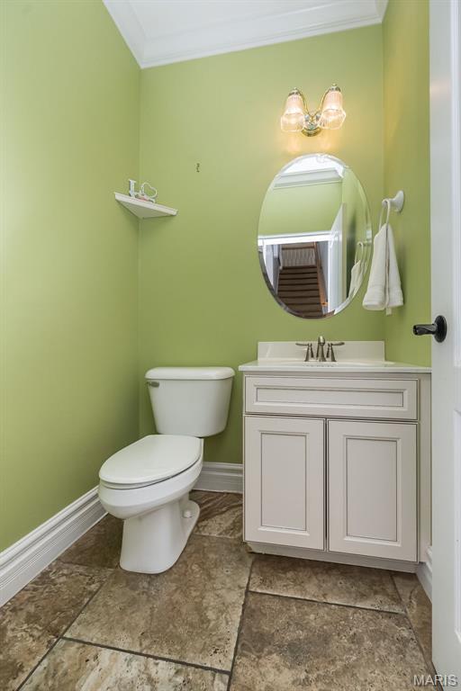 2314 Longest Dr, Wentzville, MO 63385 - half bath featuring crown molding and vanity