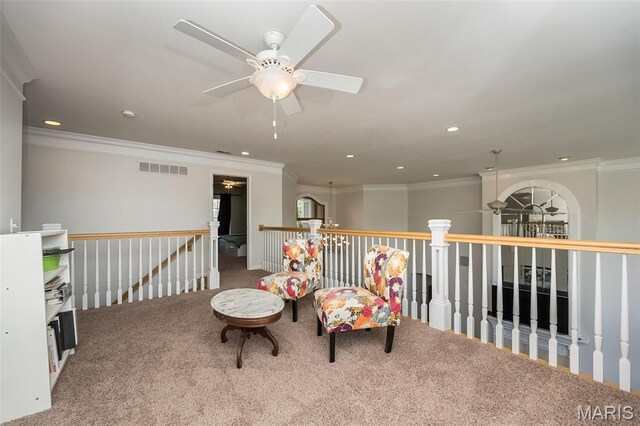 2314 Longest Dr, Wentzville, MO 63385 - living area with an upstairs landing, crown molding, a ceiling fan, carpet, and recessed lighting