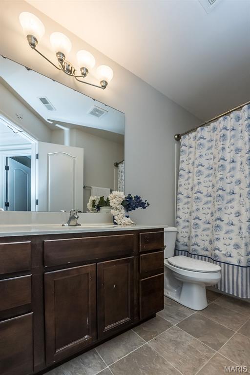 2314 Longest Dr, Wentzville, MO 63385 - bathroom with vanity and toilet