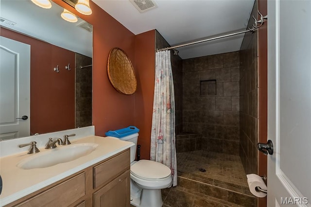 2314 Longest Dr, Wentzville, MO 63385 - bathroom with vanity, a tile shower, and tile patterned flooring