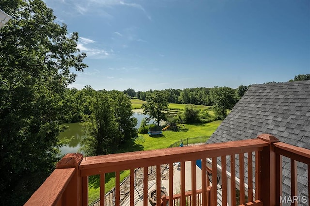 2314 Longest Dr, Wentzville, MO 63385 - wooden terrace featuring a water view, a lawn, and view of wooded area
